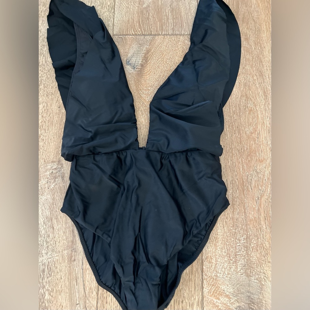 NWT Vix Solid Liz One Piece Full. Deep V front and back ruffle shoulder